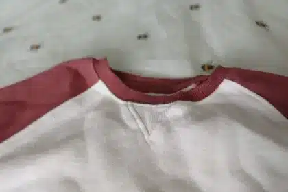 Hidden Purpose of Triangle on Hoodie Necklines Revealed