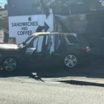 Range Rover Crash Ignites Fire at Wednesbury Cafe