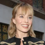 Margot Robbie Stuns in McQueen Military Jacket at 1536 Premiere