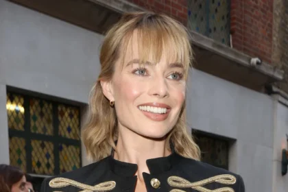 Margot Robbie Stuns in McQueen Military Jacket at 1536 Premiere